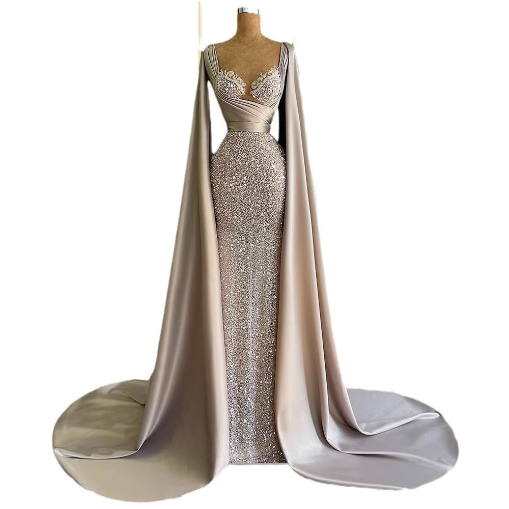 Celestial Elegance Sequin Cape Gown
