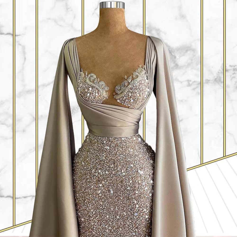 Celestial Elegance Sequin Cape Gown