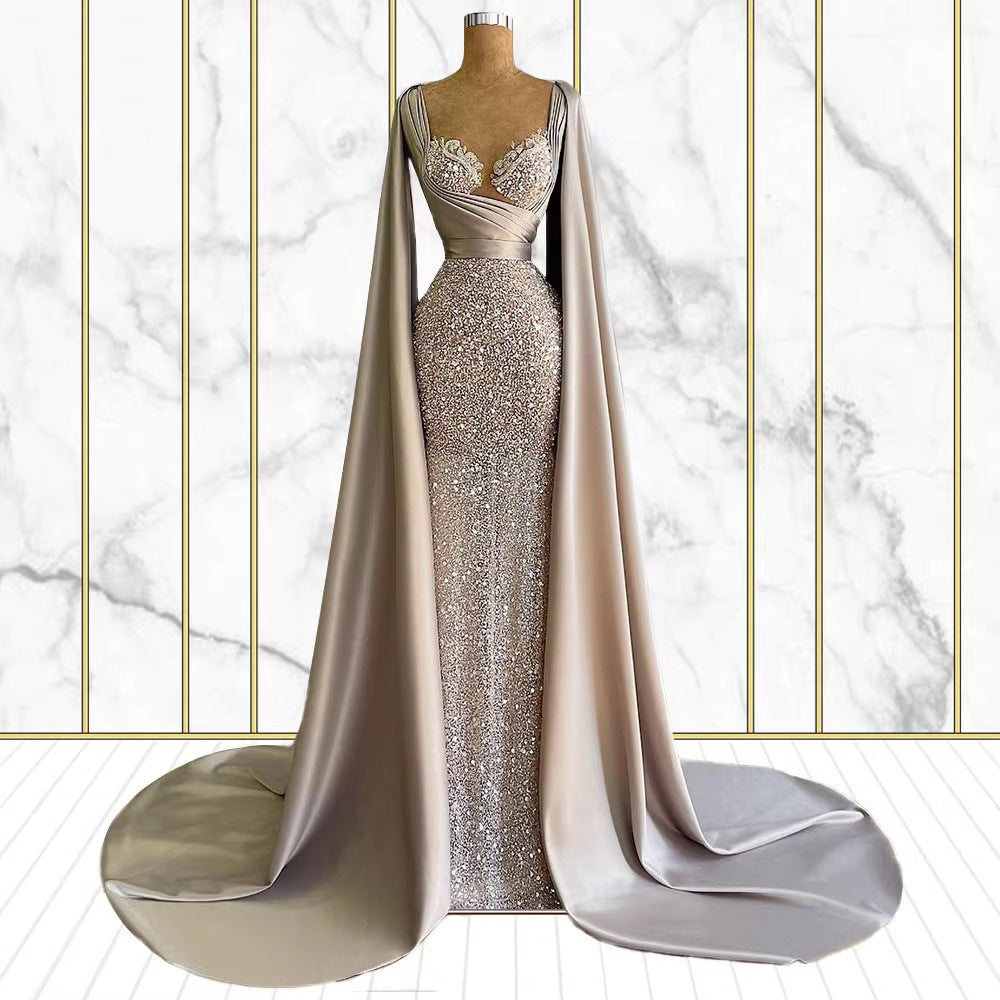 Celestial Elegance Sequin Cape Gown